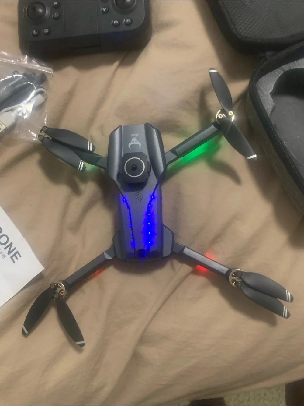 Black VR/Drone Controller with USB Cable and Spare Propellers